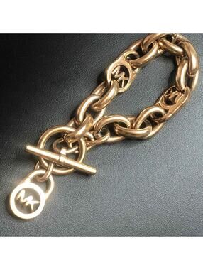 8277 Michael Kors Rosetone toggle MK Logo Lock chain Bracelet 8"